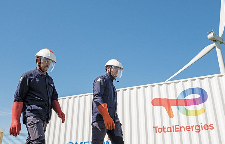 TotalEnergies field workers at an industrial site